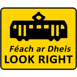 Tram lane warning signs for pedestrians (look right)